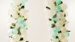 Up, up and away! DIY balloon wedding arch