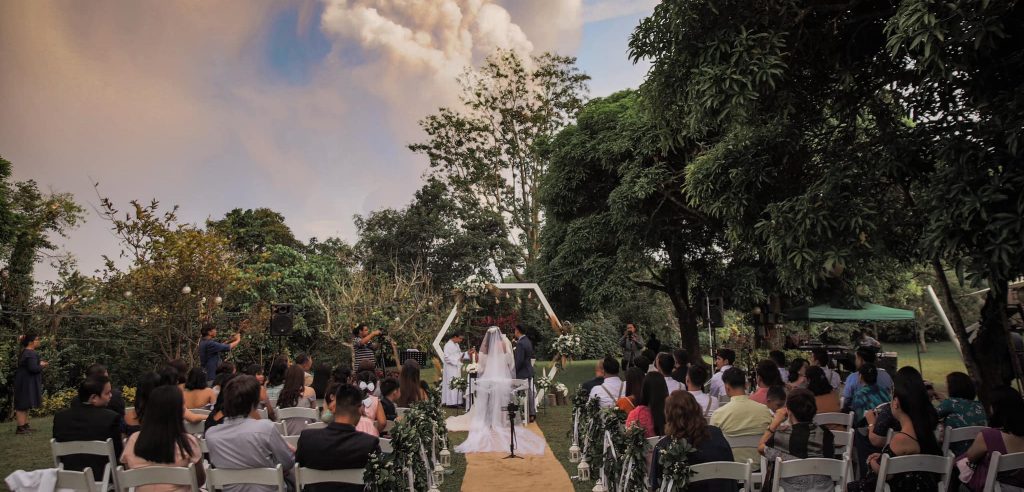 Couple wed in front of spewing volcano