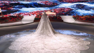 Dubai designer unveils 3-metre long wedding gown