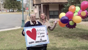 Man celebrates anniversary outside wife's nursing home