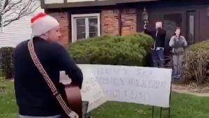 Family serenade social distancing couple on 50th anniversary