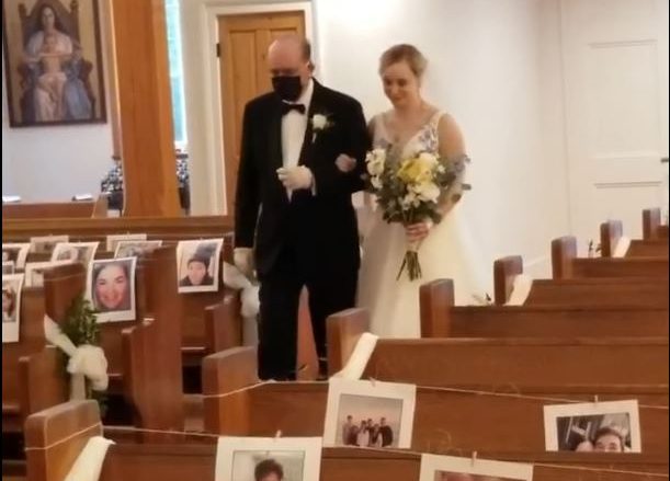 Nurses have self-isolation wedding, fill pews with photos