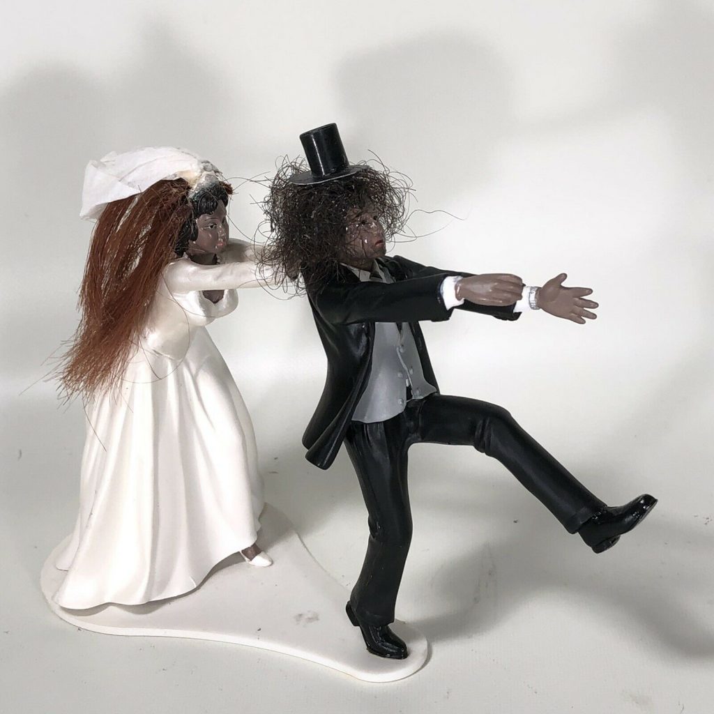 Purchase a wedding cake topper with Slash's real hair