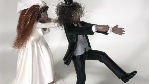 Purchase a wedding cake topper with Slash's real hair