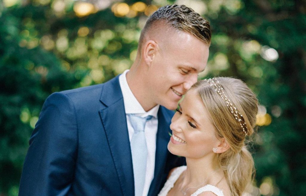 Bernd Leno with his wife at their wedding ceremony. (Credit: Wedding ETC)