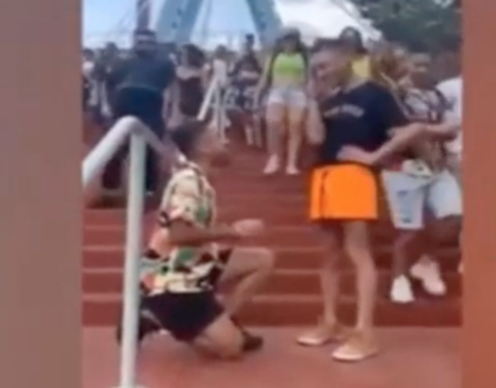 Sweet double proposal at theme park goes viral
