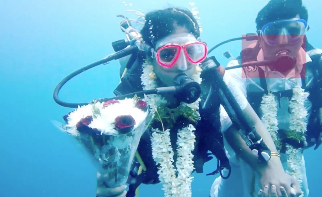 Couple marry in what may be the first traditional Hindu underwater wedding